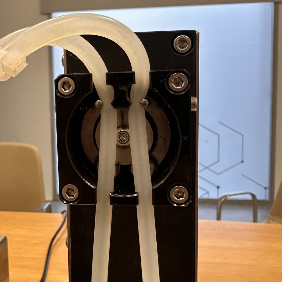 ADDS device front view with dosing head and tubing